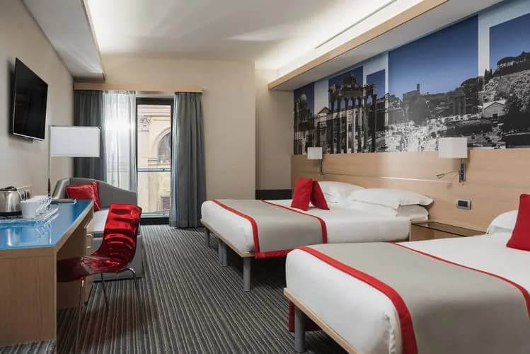 Quad room at iQ Hotel Roma